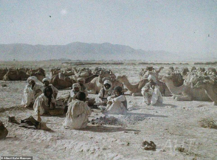 http://www.afghanhoundtimes.com PHOTO Camel herders resting during a journey through the deserts of southern  Afghanistan