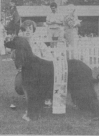 Afghan Hound Times photo - Anette Buxton exhibiting her home-bred Ch Pania Kazibari in 1977