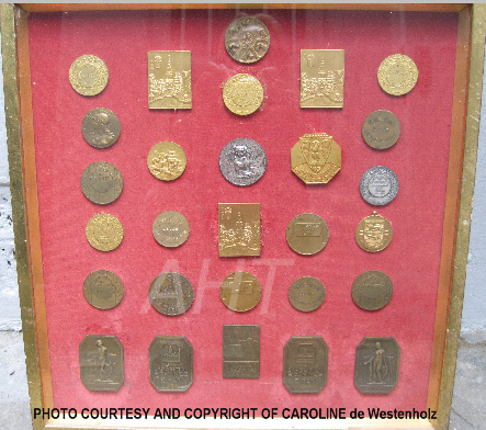 http://www.afghanhoundtimes.com PHOTO Medals won by Barroness de Westenholz at Europen dog shows 1920's
